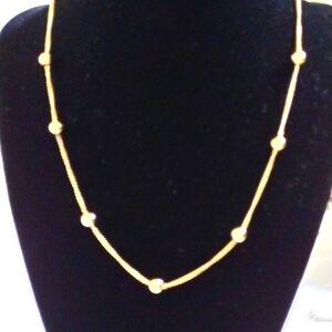 LR faux gold chain necklace with spaced faux gold beads.